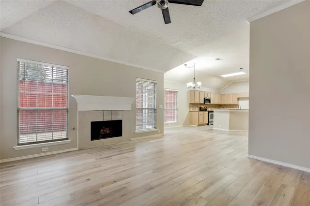 a view of a kitchen with furniture and a fireplace