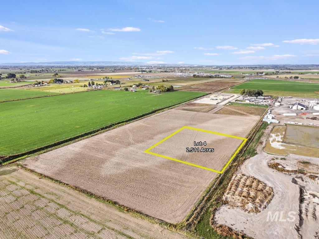 200 South 200 West Rupert, ID 83350 - Photo 2 of 25 Overview of rural landscape featuring large plots for crops and property parcel outlined