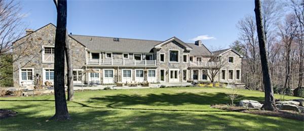 4 Summit Road Weston, MA 02493 - Photo 14 of 15 a front view of a house with a garden