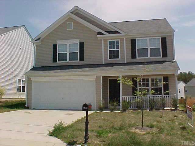 a front view of a house with a porch