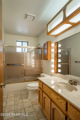 a view of a house with a small yard