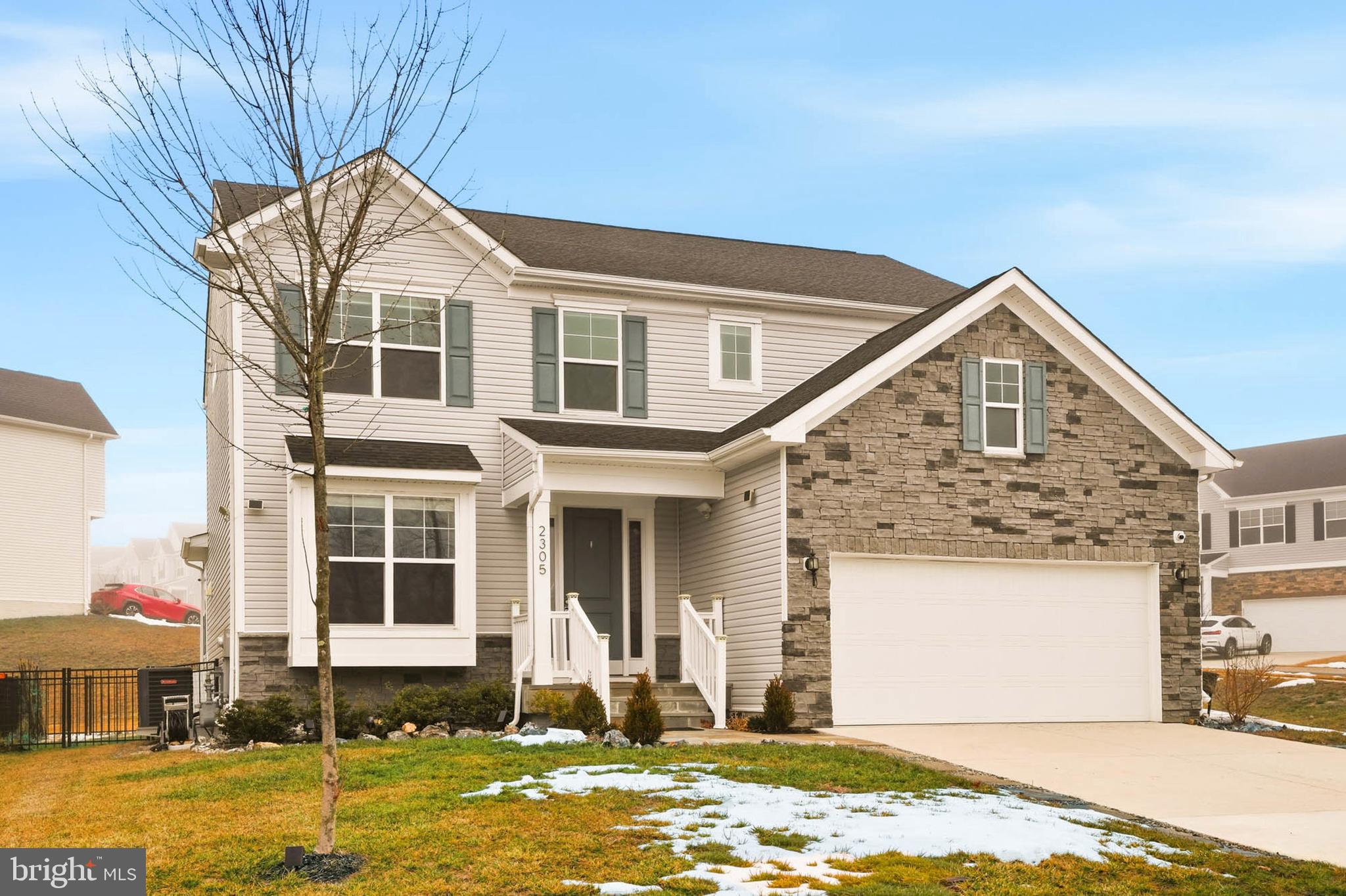 a front view of a house with swimming pool