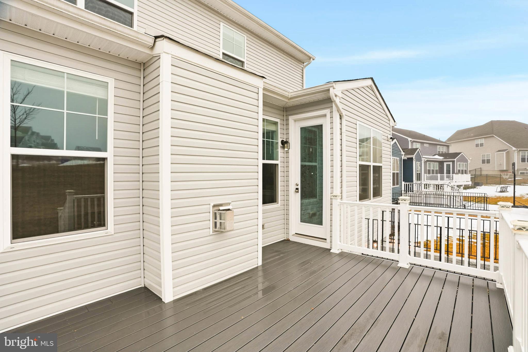 2305 Connor Circle Mount Airy, MD 21771 - Photo 11 of 44 a view of a house with a wooden deck