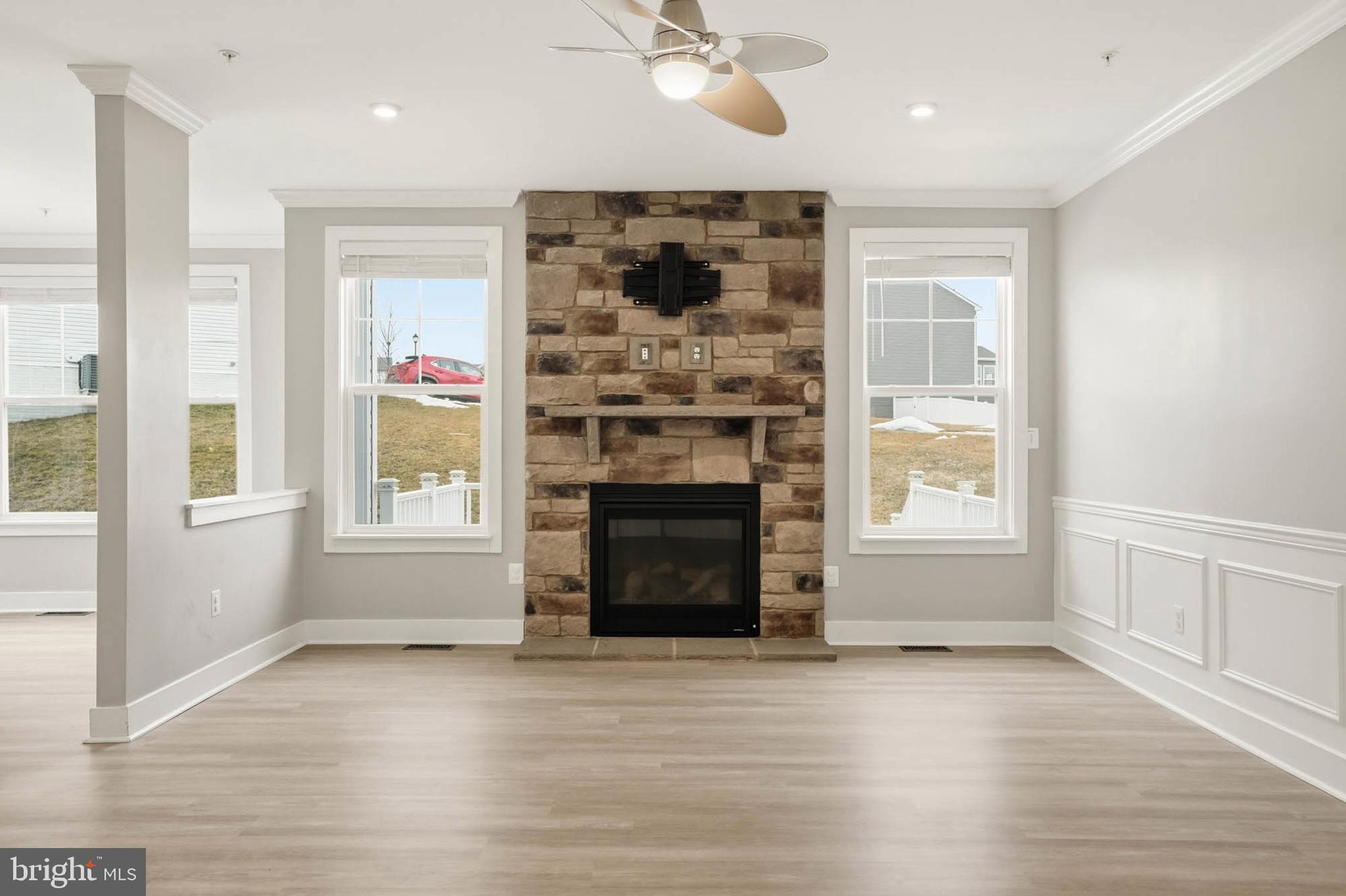 2305 Connor Circle Mount Airy, MD 21771 - Photo 14 of 44 an empty room with windows and fireplace