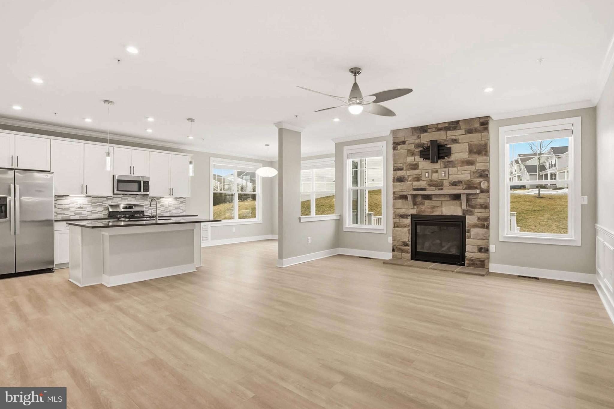 2305 Connor Circle Mount Airy, MD 21771 - Photo 44 of 44 a view of kitchen with kitchen island wooden floor and stainless steel appliances