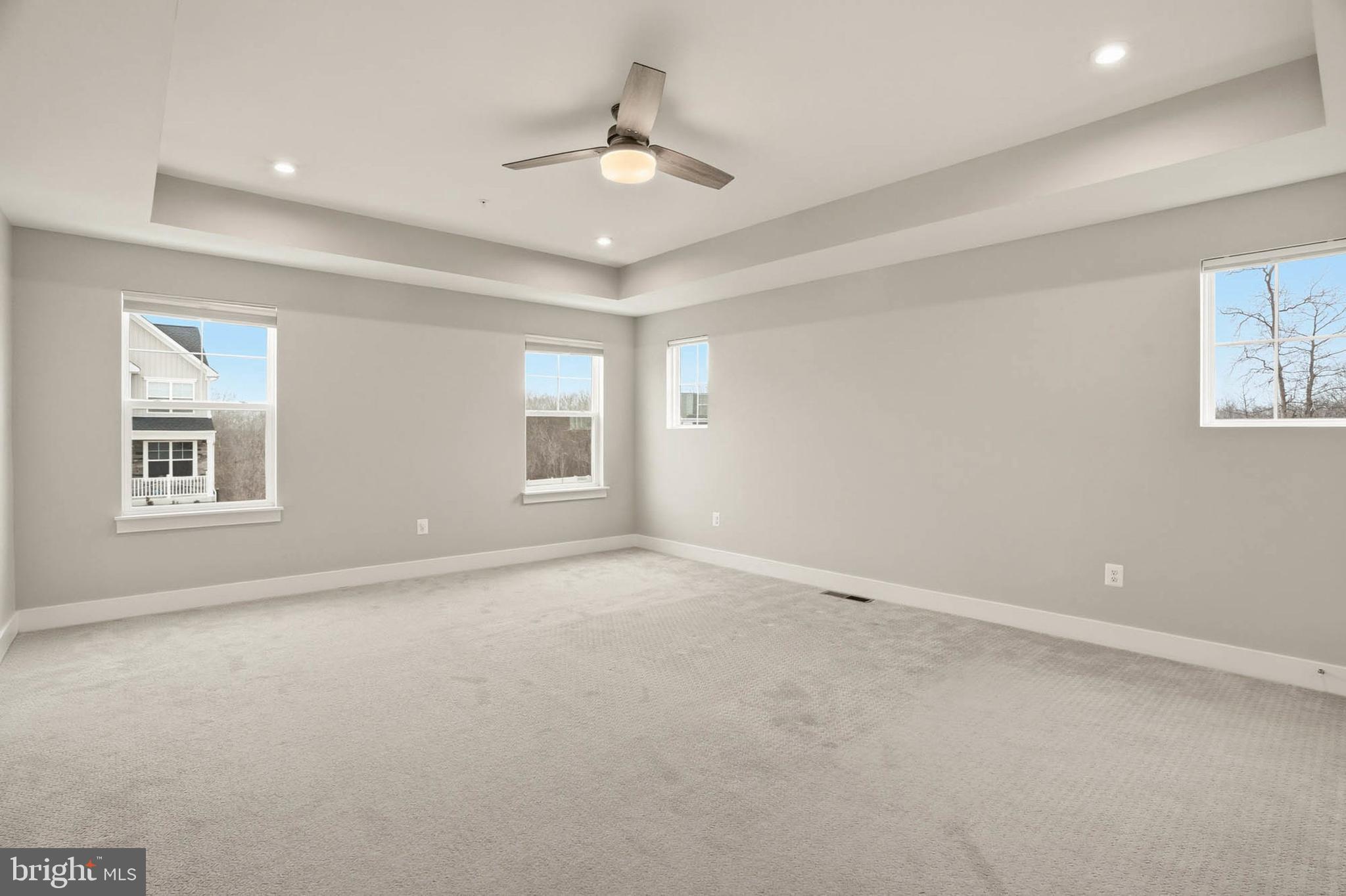 2305 Connor Circle Mount Airy, MD 21771 - Photo 22 of 44 an empty room with windows and fan