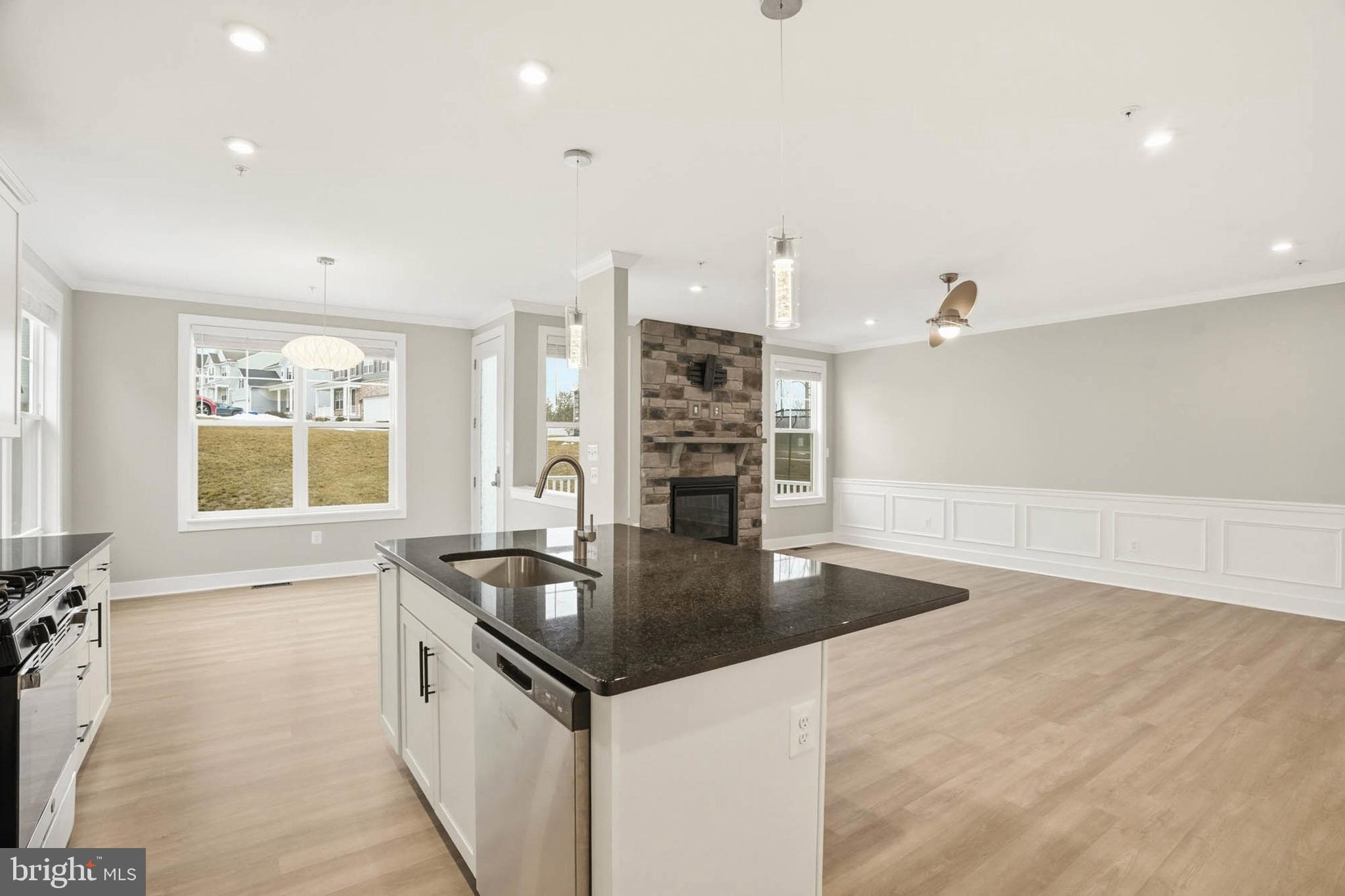 2305 Connor Circle Mount Airy, MD 21771 - Photo 8 of 44 a kitchen with stainless steel appliances granite countertop a sink and a refrigerator