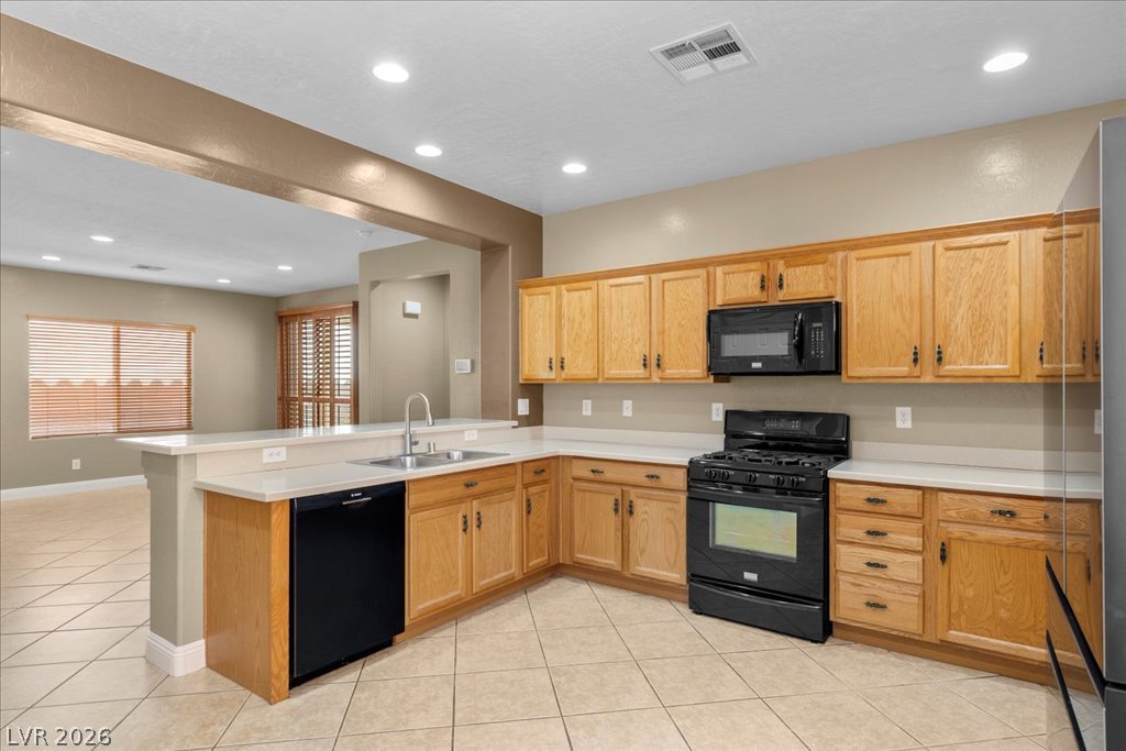 2627 Dirleton Place Henderson, NV 89044 - Photo 5 of 42 The open-concept design keeps everyone connected, whether you're preparing meals, hosting friends, or enjoying everyday moments together.