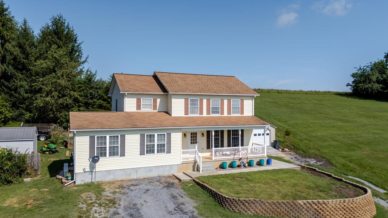 107 Orchard Road Staunton, VA 24401 - Photo 33 of 44 a front view of a house with a garden