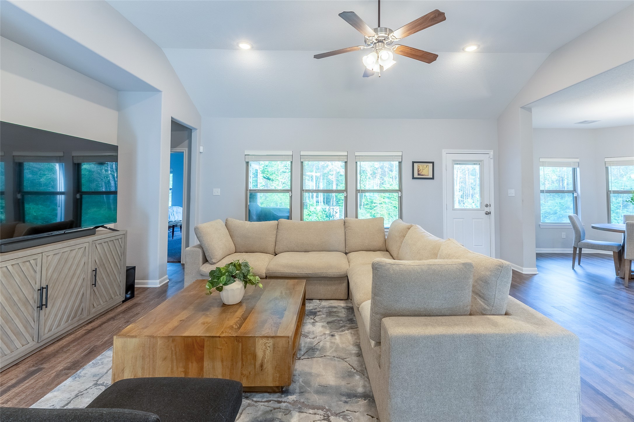 120 Sanctuary Road Huntsville, TX 77340 - Photo 12 of 38 a living room with furniture and a large window