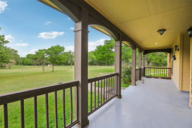 a view of a city street from a balcony