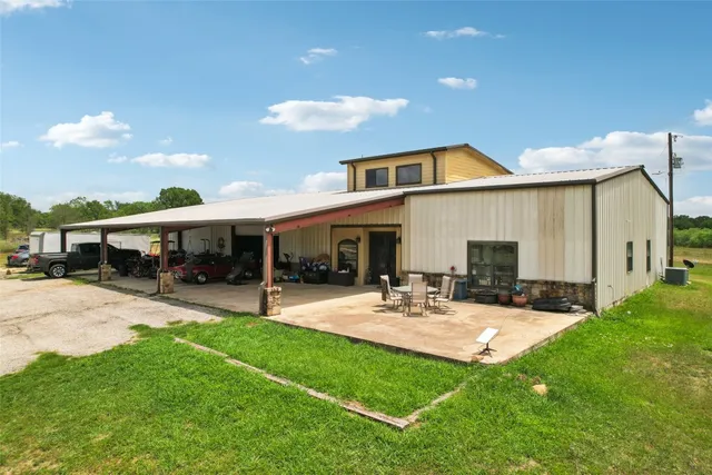 a view of outdoor space yard deck patio and fire pit