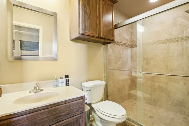 a view of a terrace with a table and chairs