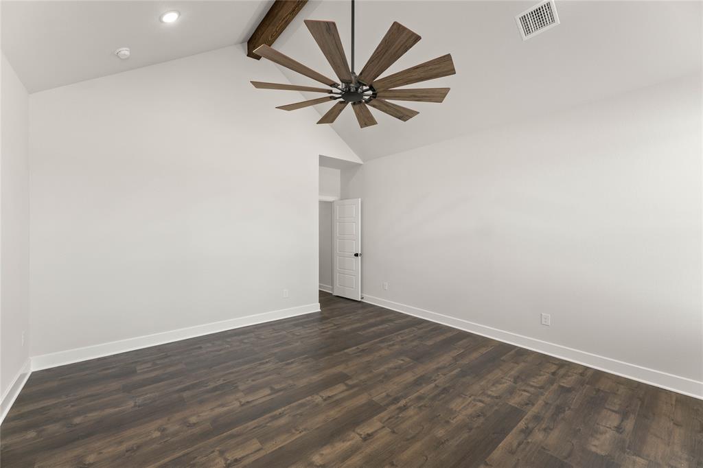 441 Collum View Azle, TX 76020 - Photo 22 of 38 Unfurnished room with beamed ceiling, dark wood-style floors, and high vaulted ceiling