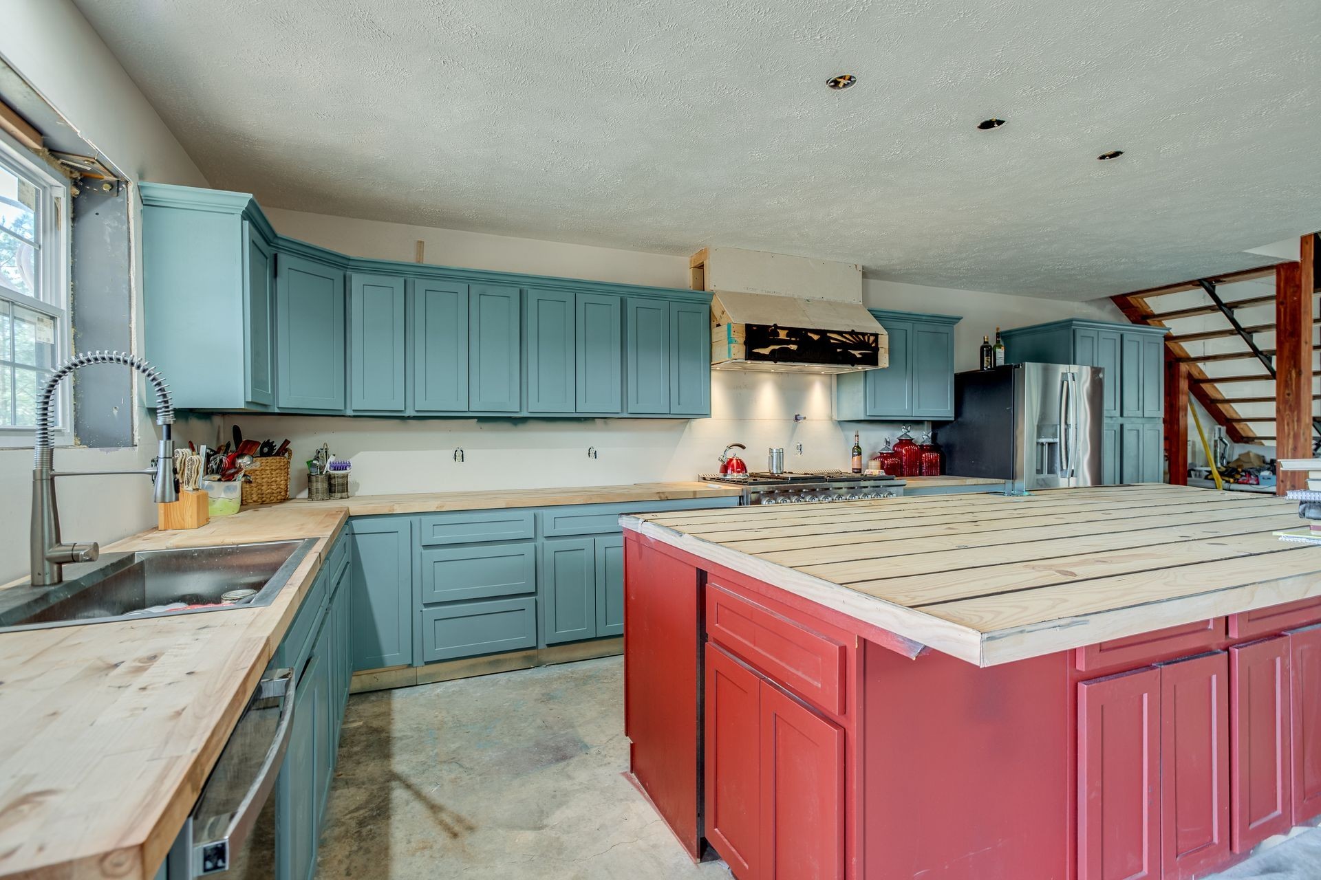 201 Summit Drive Linden, TN 37096 - Photo 11 of 31 a kitchen with a sink stove and cabinets