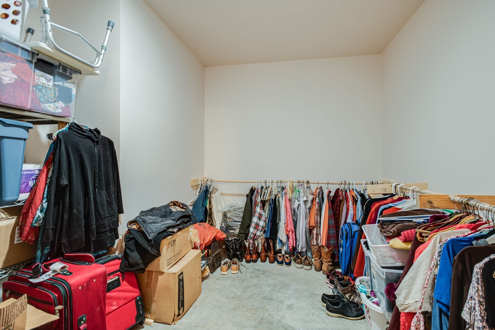 201 Summit Drive Linden, TN 37096 - Photo 23 of 31 a view of walk in closet with clothes and shoes