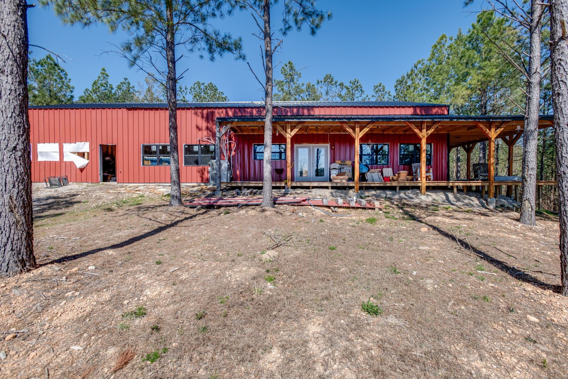 201 Summit Drive Linden, TN 37096 - Photo 31 of 31 a front view of a building with parking