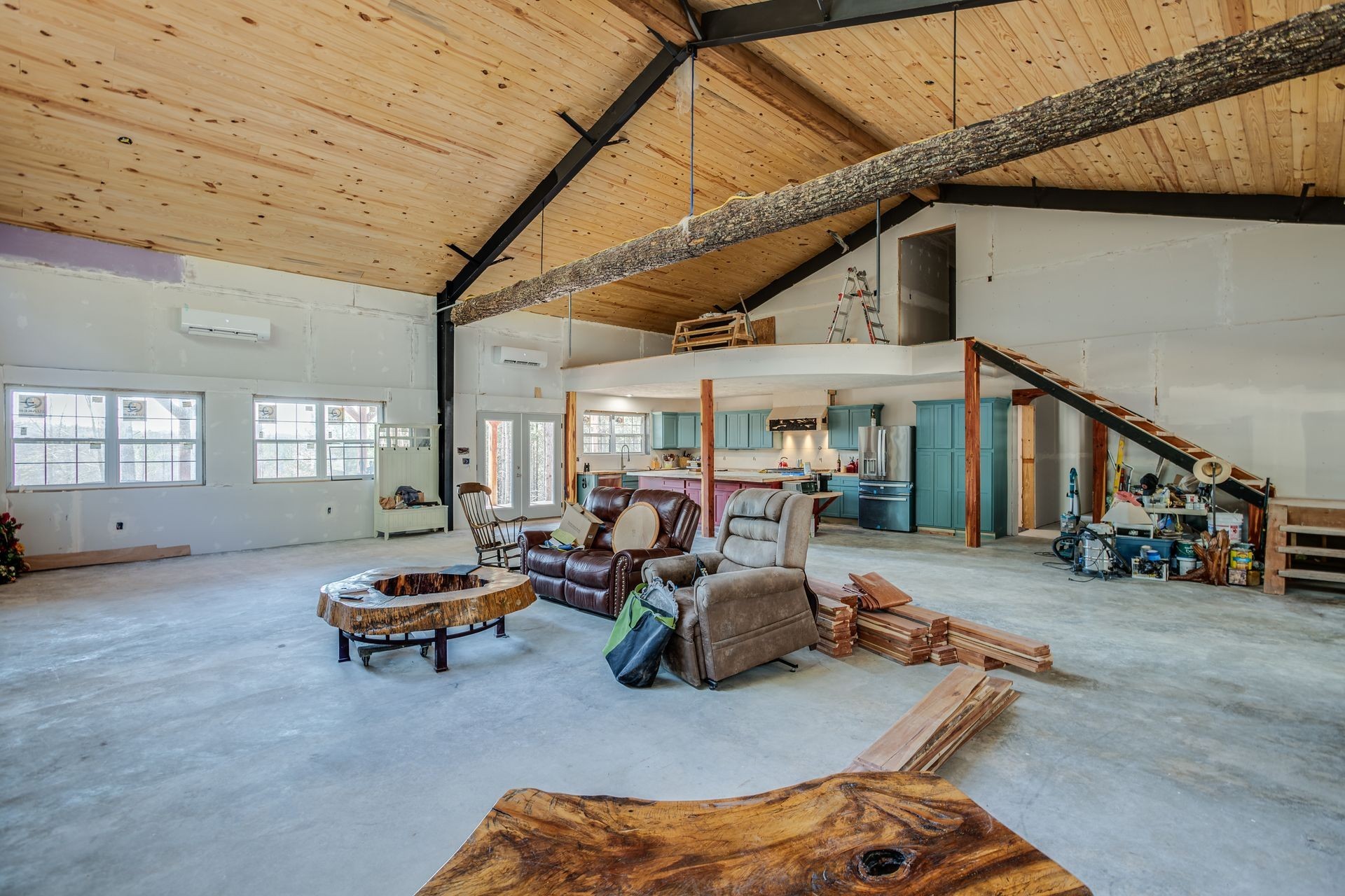201 Summit Drive Linden, TN 37096 - Photo 7 of 31 a living room with furniture gym equipment and a large window