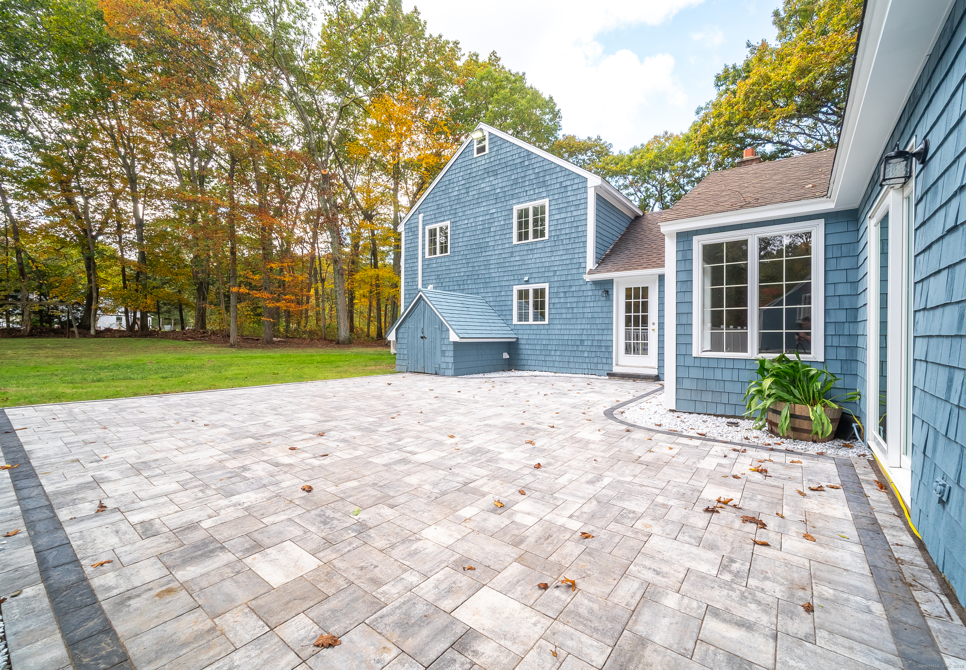 882 Killingworth Road Haddam, CT 06441 - Photo 12 of 40 a front view of a house with a yard and garage