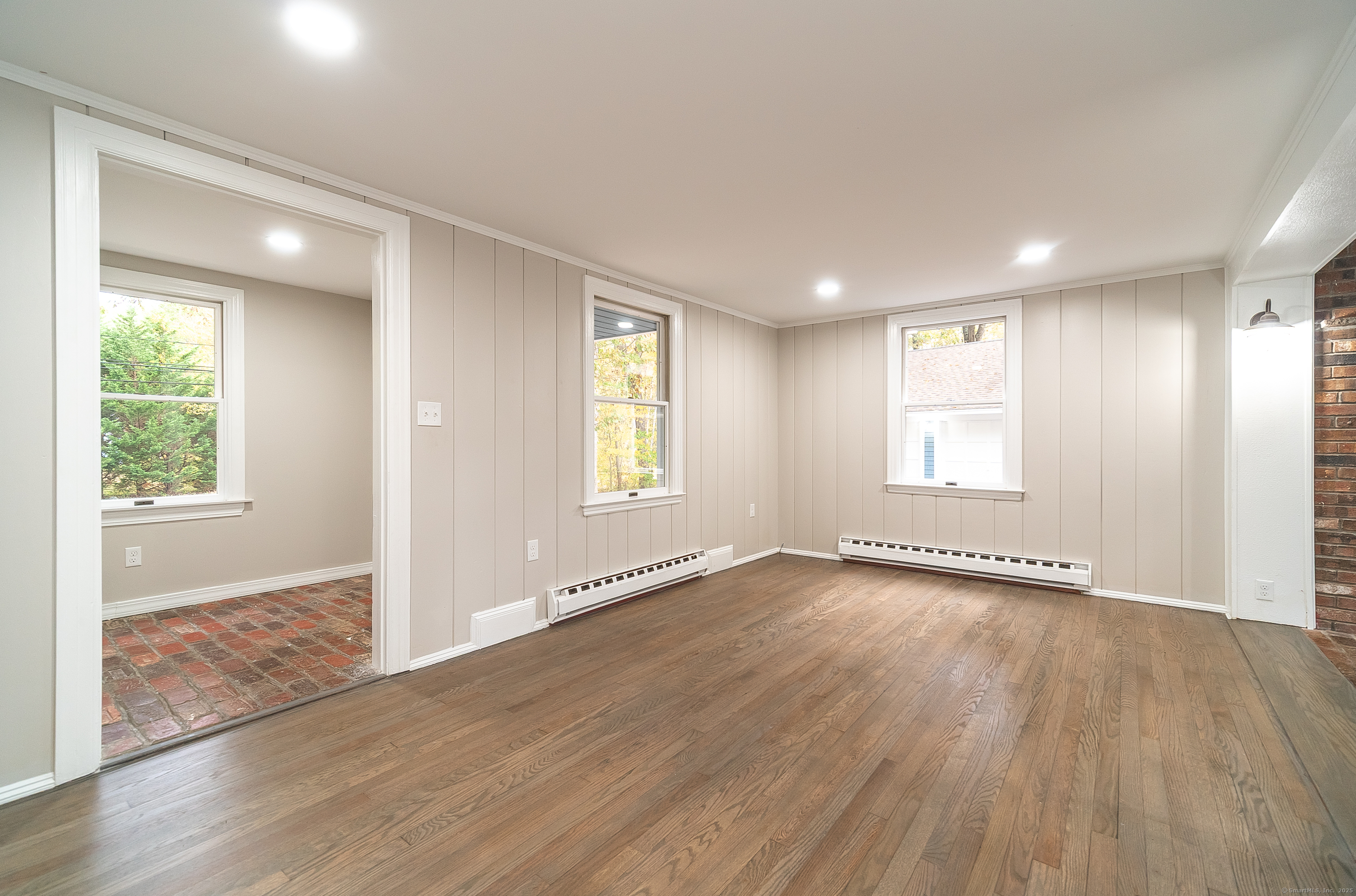 882 Killingworth Road Haddam, CT 06441 - Photo 25 of 40 an empty room with wooden floor and windows