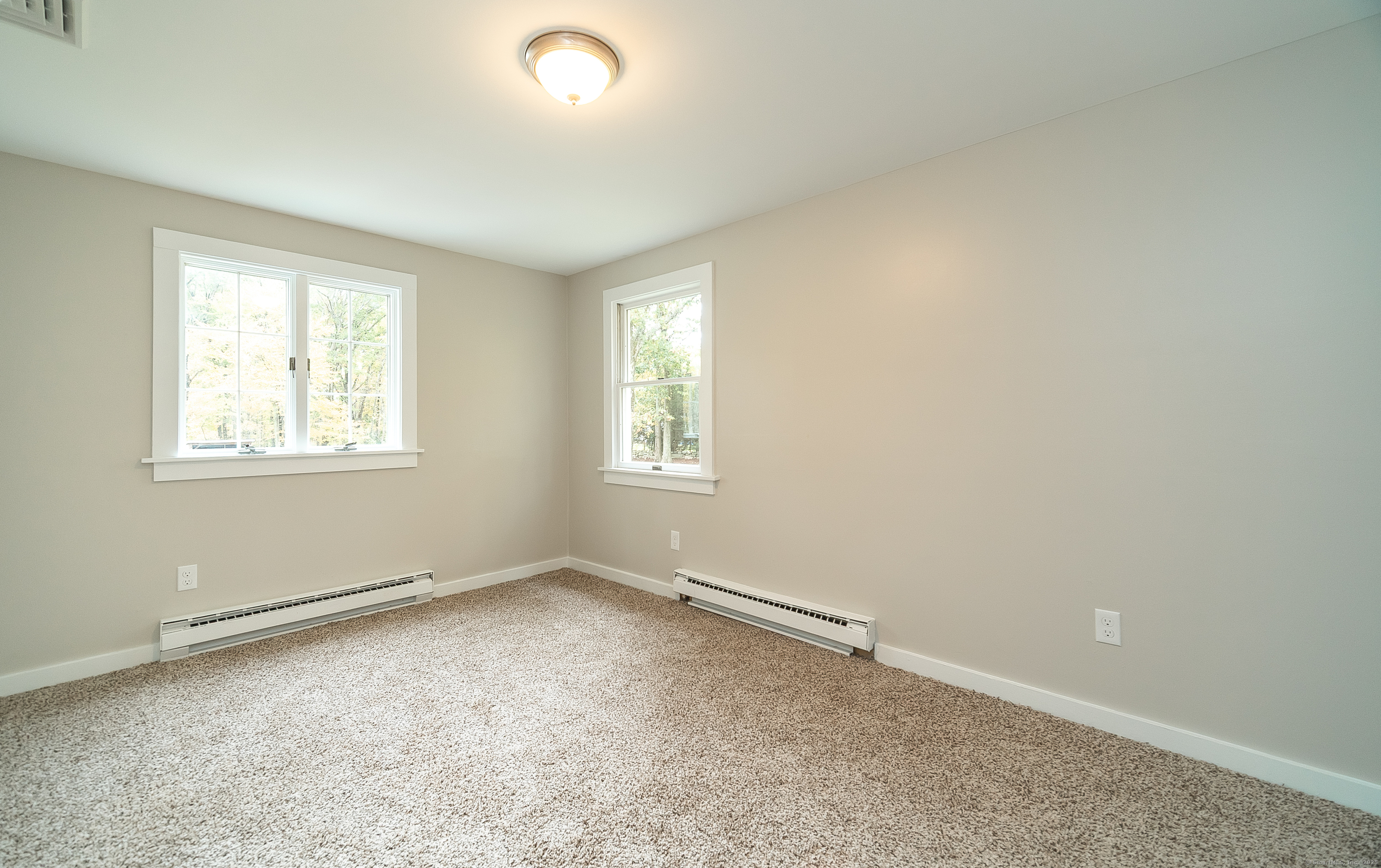 882 Killingworth Road Haddam, CT 06441 - Photo 33 of 40 an empty room with windows