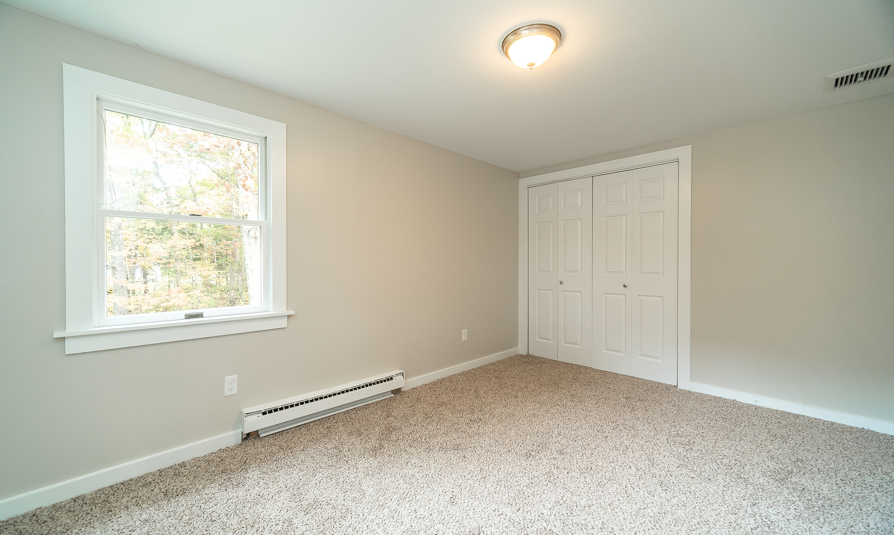 882 Killingworth Road Haddam, CT 06441 - Photo 34 of 40 an empty room with a window