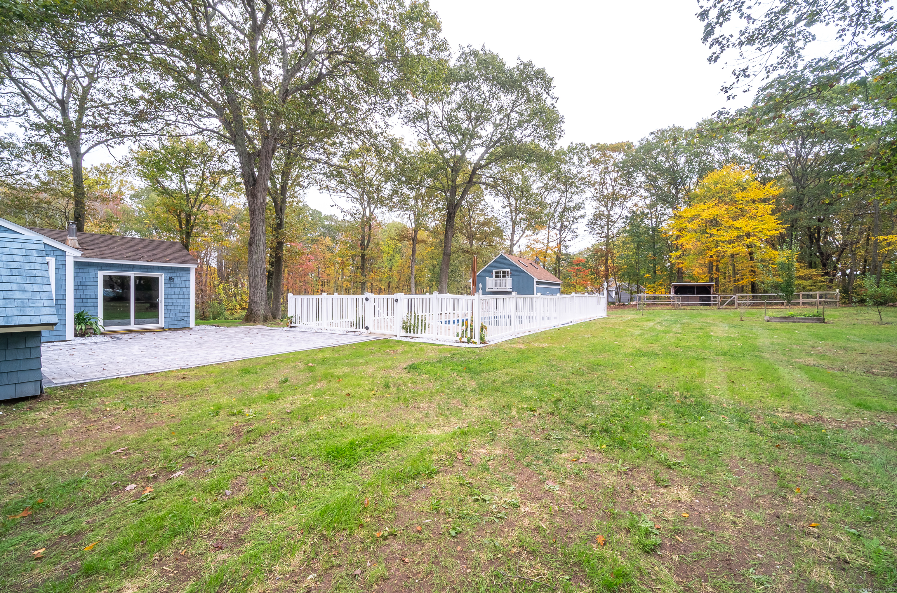 882 Killingworth Road Haddam, CT 06441 - Photo 7 of 40 a view of a house with a backyard and a tree
