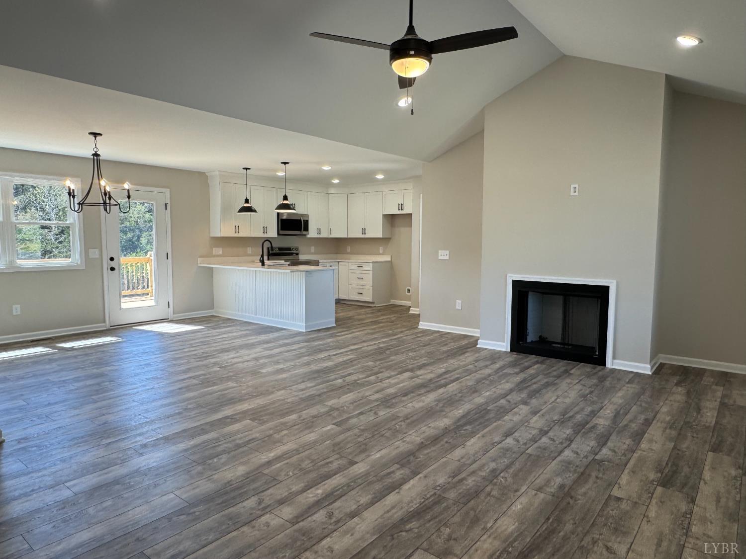 604 Stratford Road Concord, VA 24538 - Photo 3 of 28 a view of kitchen and kitchen with wooden floor