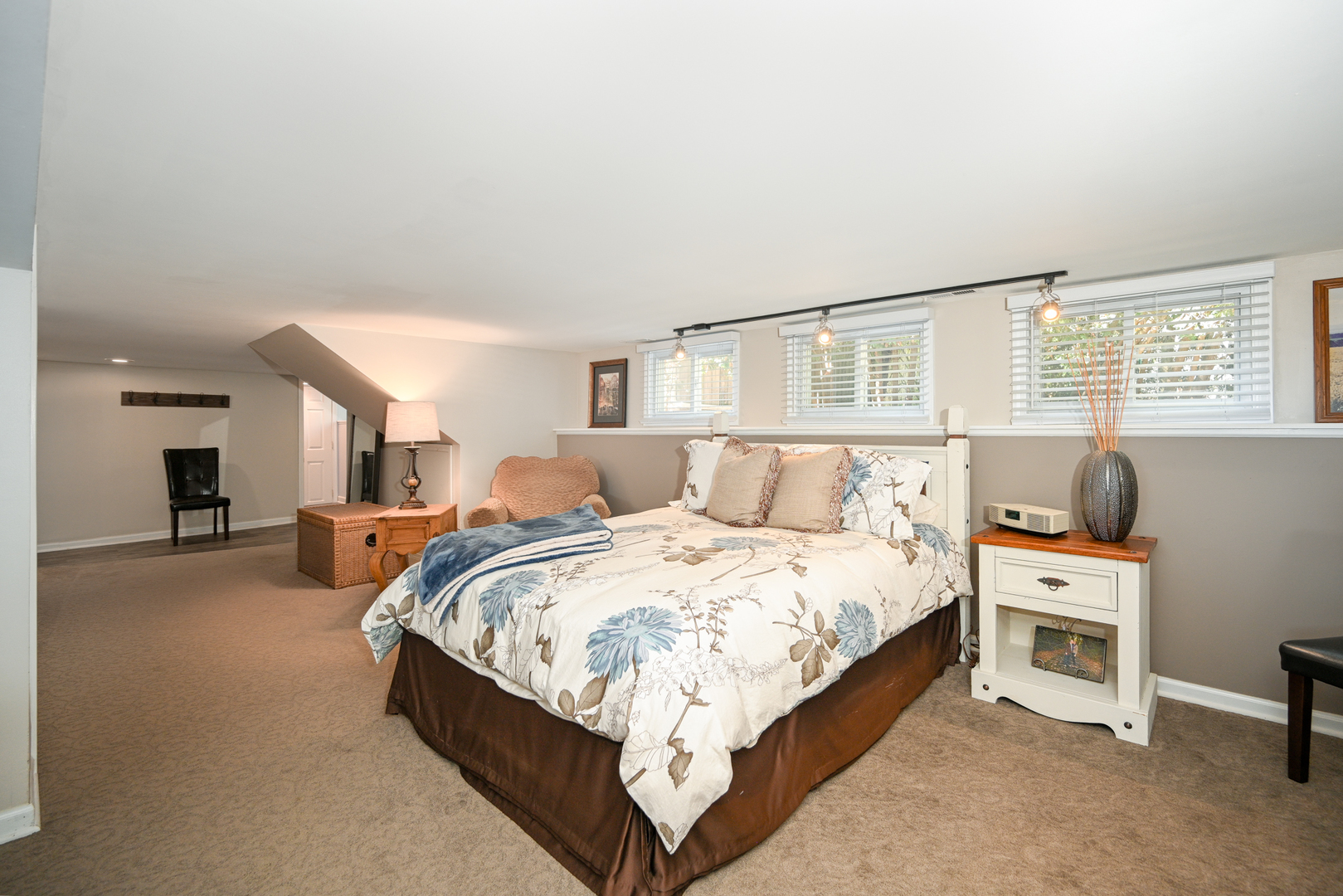 22W474 Emerson Avenue Glen Ellyn, IL 60137 - Photo 20 of 42 a bed room with a bed and a chair