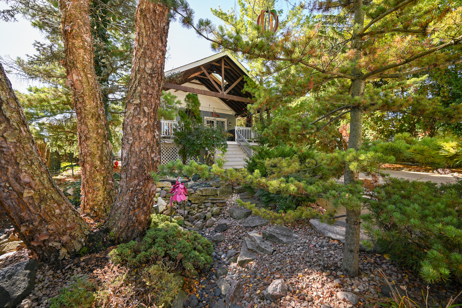 22W474 Emerson Avenue Glen Ellyn, IL 60137 - Photo 31 of 42 a yellow building with trees in the background