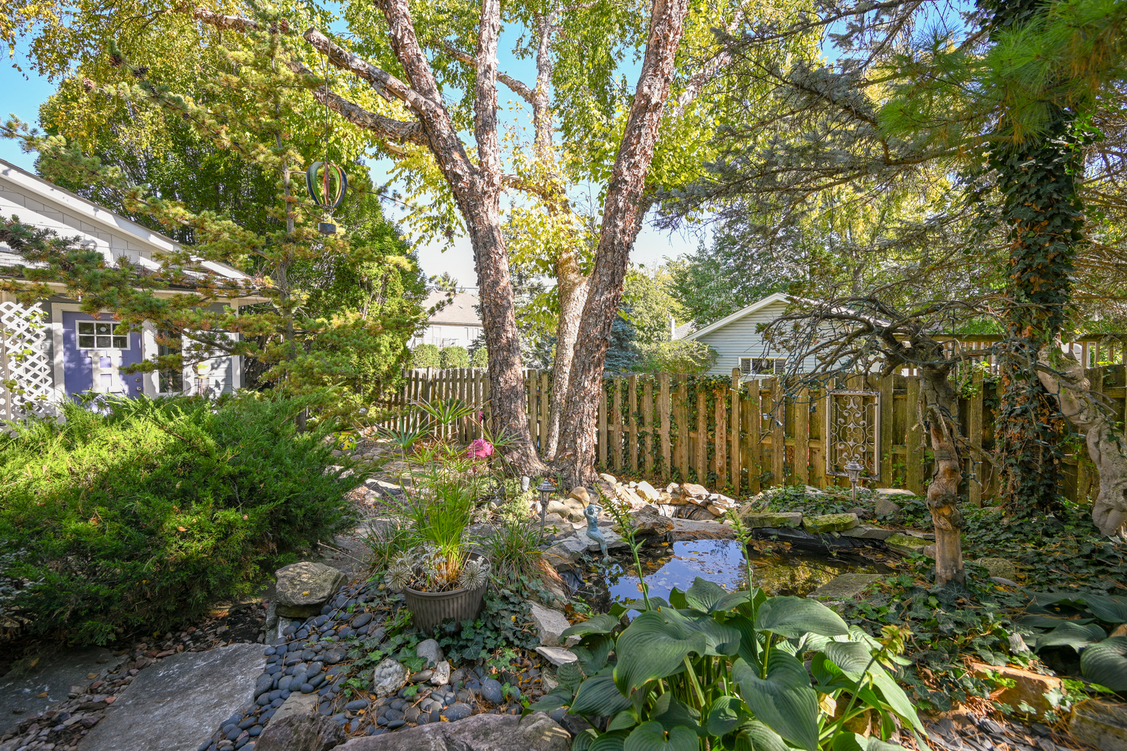 22W474 Emerson Avenue Glen Ellyn, IL 60137 - Photo 33 of 42 a backyard of a house with lots of green space