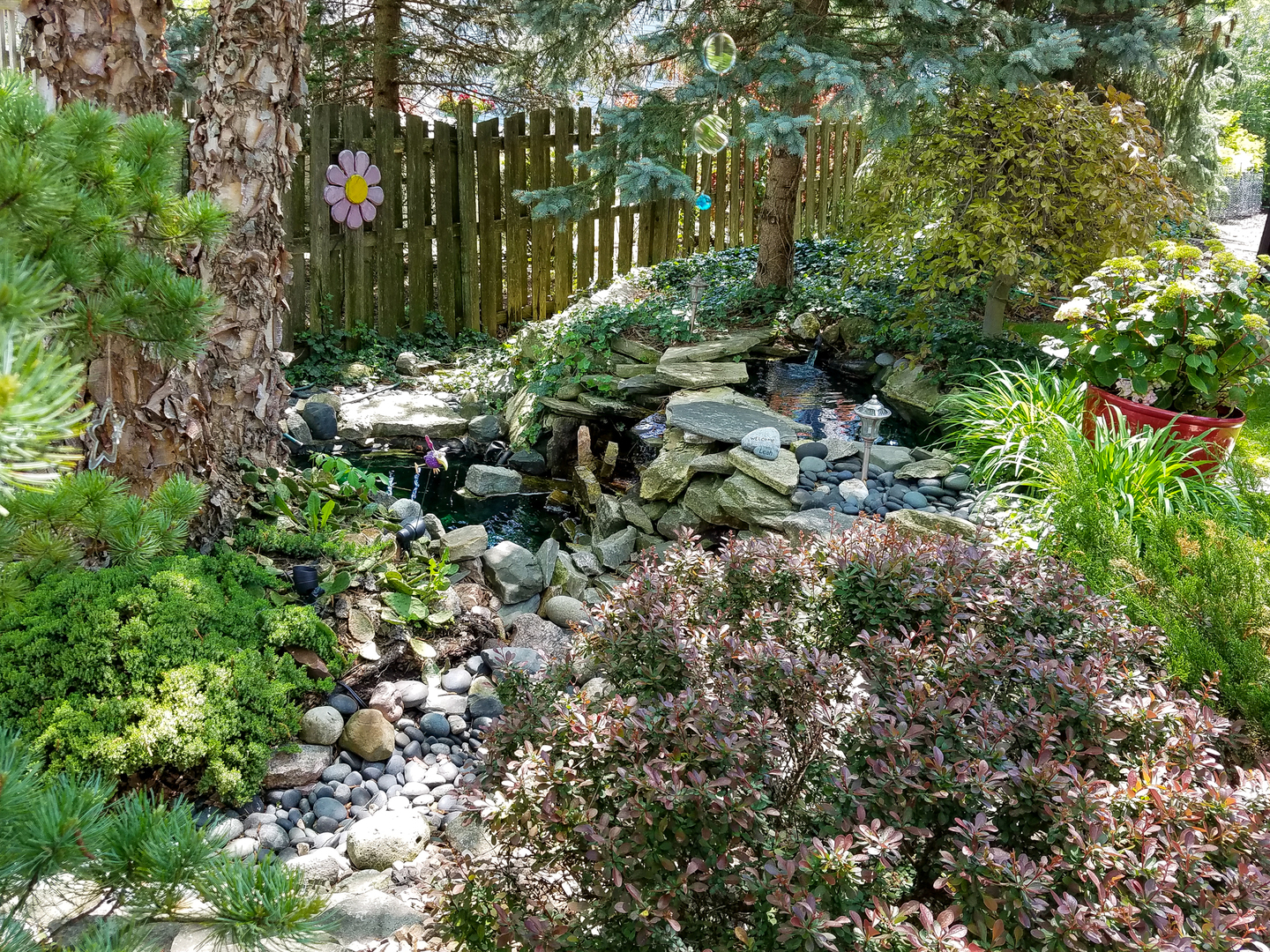 22W474 Emerson Avenue Glen Ellyn, IL 60137 - Photo 37 of 42 a view of a garden with plants
