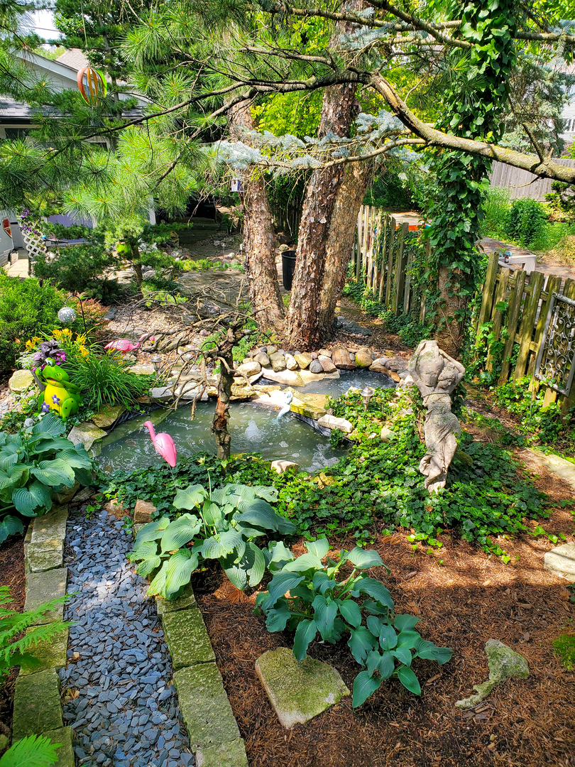 22W474 Emerson Avenue Glen Ellyn, IL 60137 - Photo 38 of 42 a backyard of a house with a yard and outdoor seating