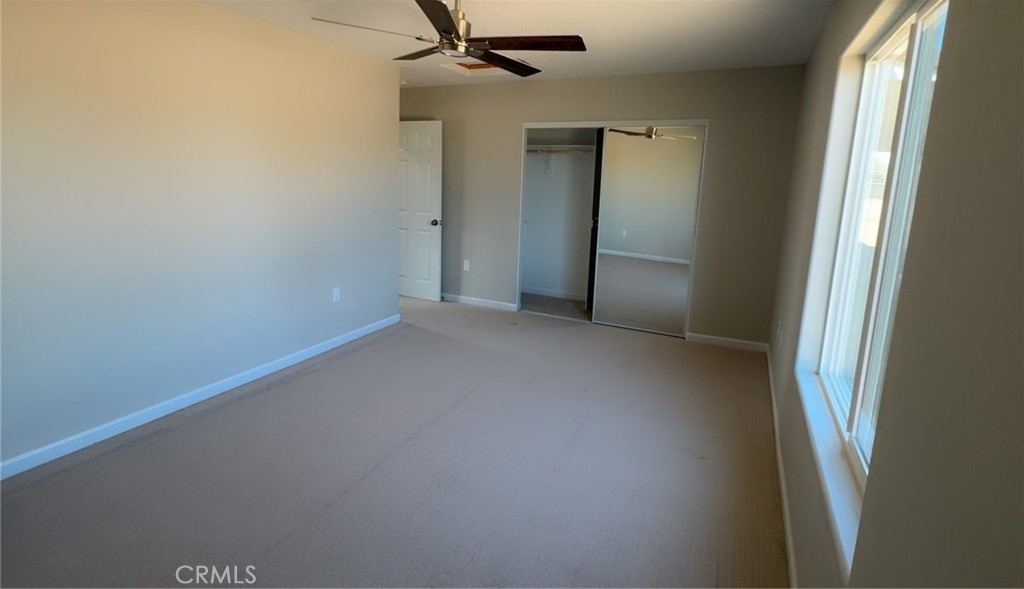 16506 Cactus Street Hesperia, CA 92345 - Photo 25 of 34 an empty room with windows