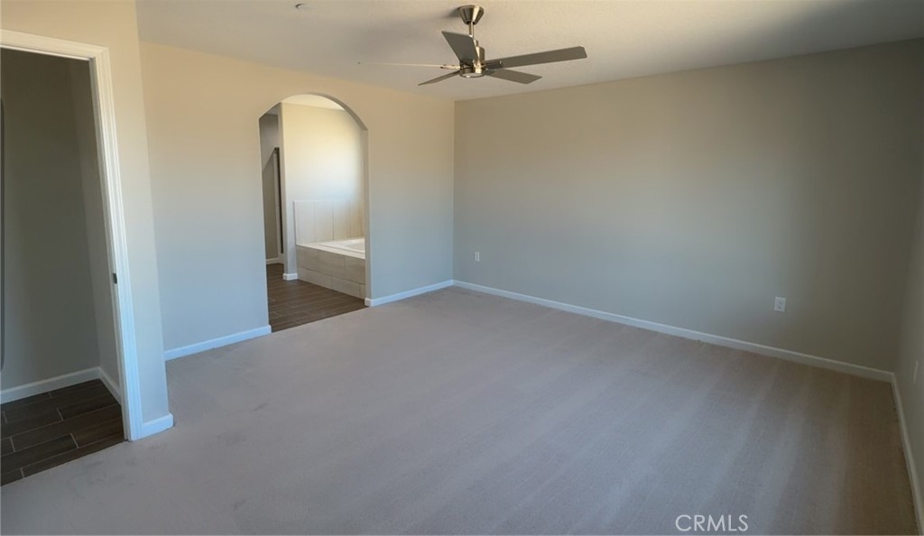 16506 Cactus Street Hesperia, CA 92345 - Photo 9 of 34 an empty room with a mirror