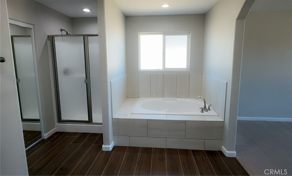 16506 Cactus Street Hesperia, CA 92345 - Photo 10 of 34 a bathroom with a bathtub and shower