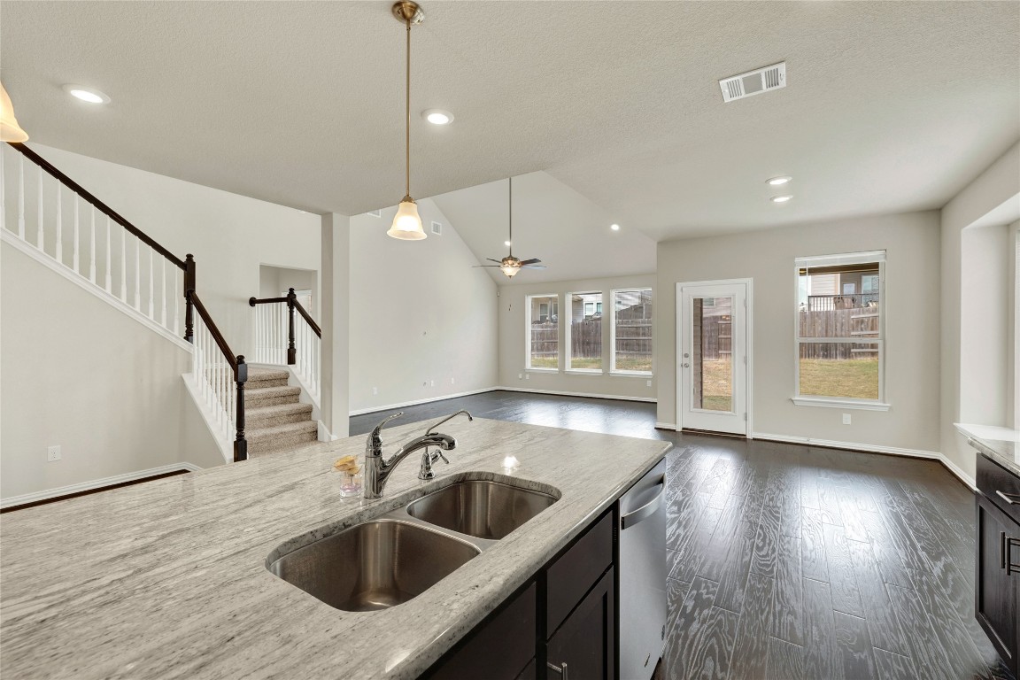 908 Leadtree Loop Buda, TX 78610 - Photo 11 of 38 a kitchen with sink and window