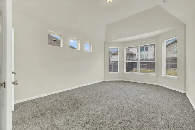 a view of empty room with windows