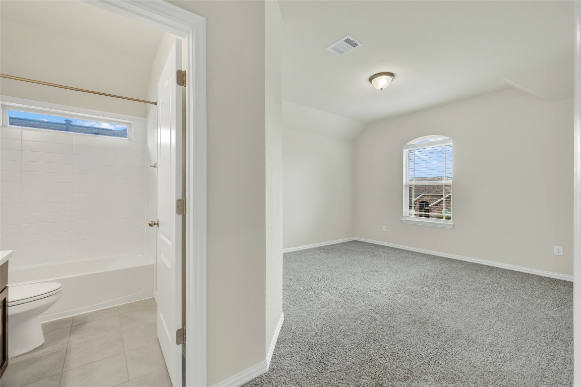908 Leadtree Loop Buda, TX 78610 - Photo 29 of 38 a view of an empty room