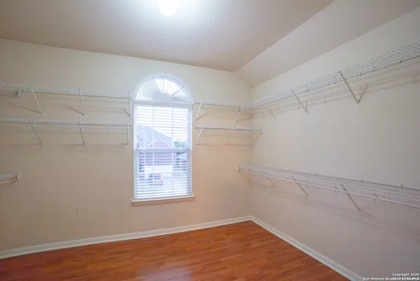 a view of a room that has a window in it