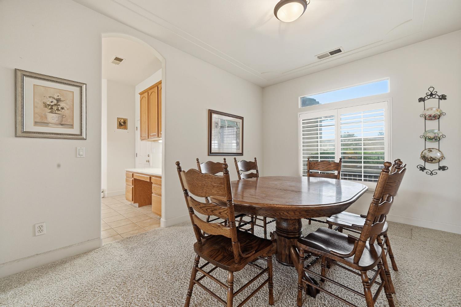 719 Shakeley Lane Ione, CA 95640 - Photo 24 of 68 a view of a dining room with furniture and window