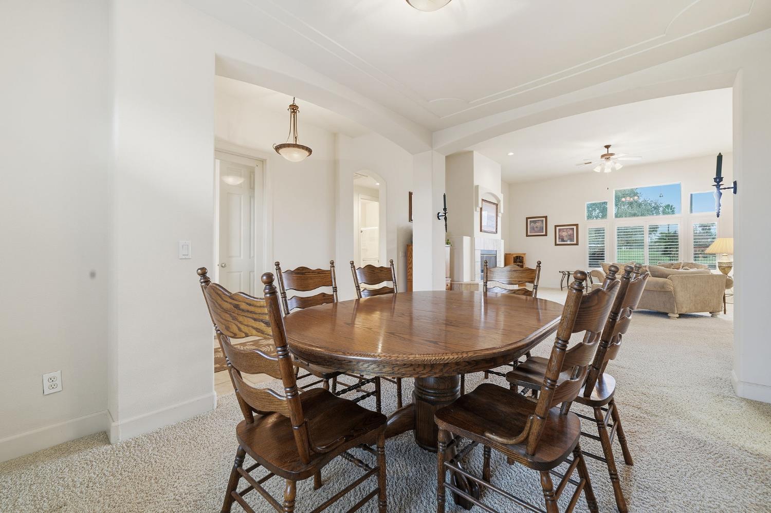 719 Shakeley Lane Ione, CA 95640 - Photo 26 of 68 a dining room with furniture and window