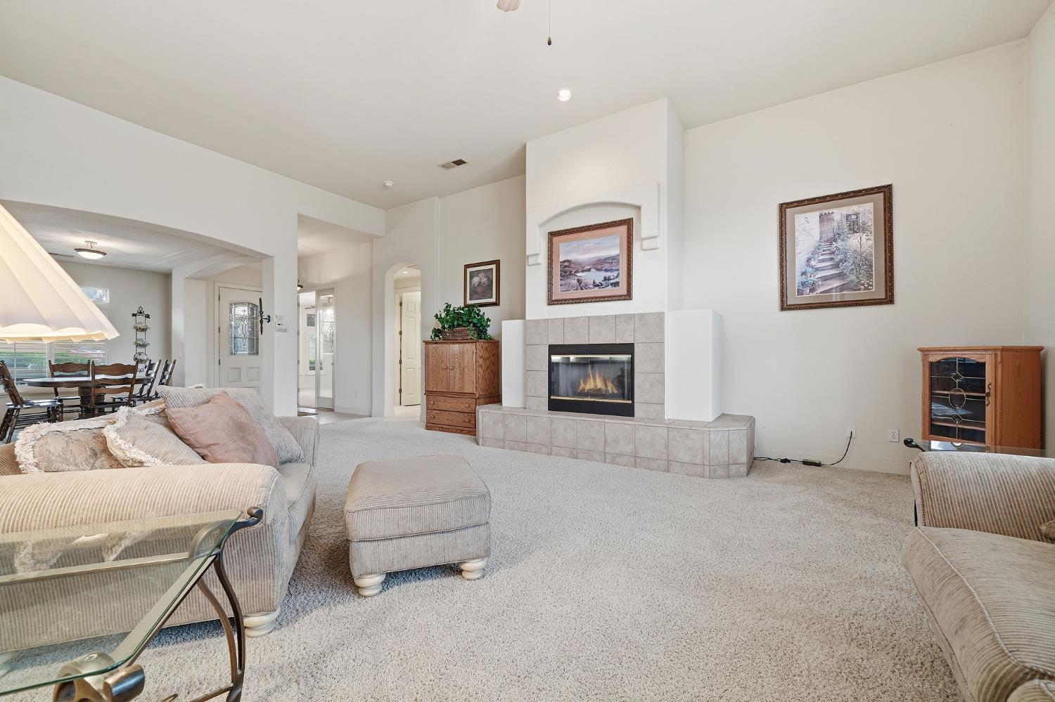 719 Shakeley Lane Ione, CA 95640 - Photo 30 of 68 a living room with furniture and a fireplace