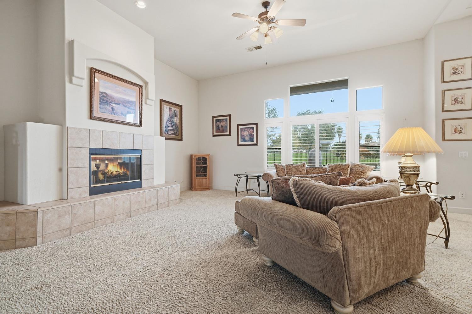 719 Shakeley Lane Ione, CA 95640 - Photo 32 of 68 a living room with furniture and a fireplace