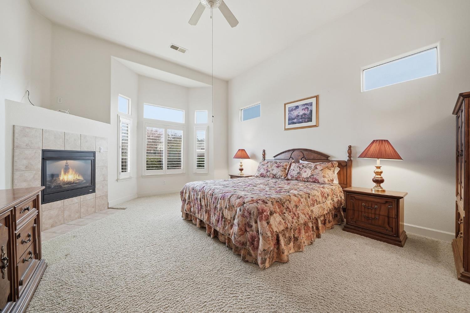 719 Shakeley Lane Ione, CA 95640 - Photo 37 of 68 a spacious bedroom with a bed and a window