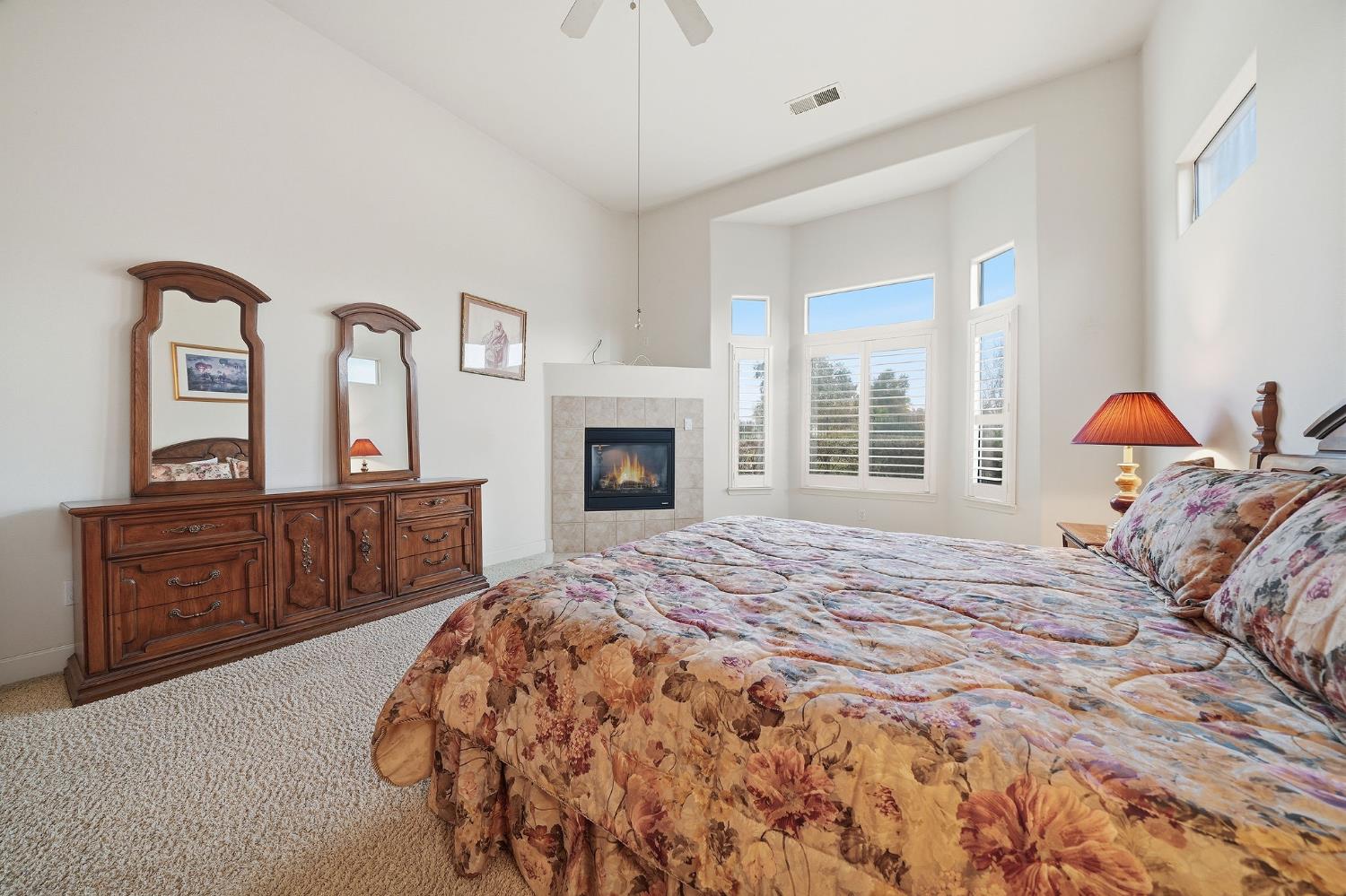 719 Shakeley Lane Ione, CA 95640 - Photo 40 of 68 a bedroom with a bed and a dresser