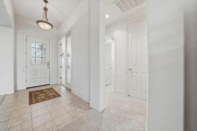 a view of a swimming pool and a yard