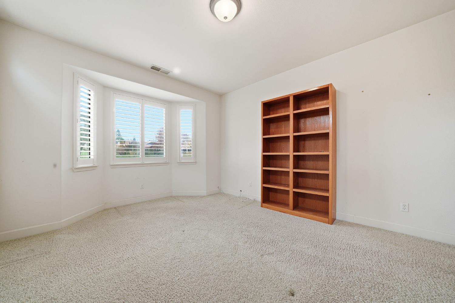 719 Shakeley Lane Ione, CA 95640 - Photo 56 of 68 a view of an empty room with a window and closet