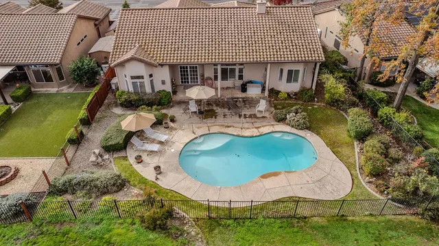 a view of a livingroom with furniture and a kitchen