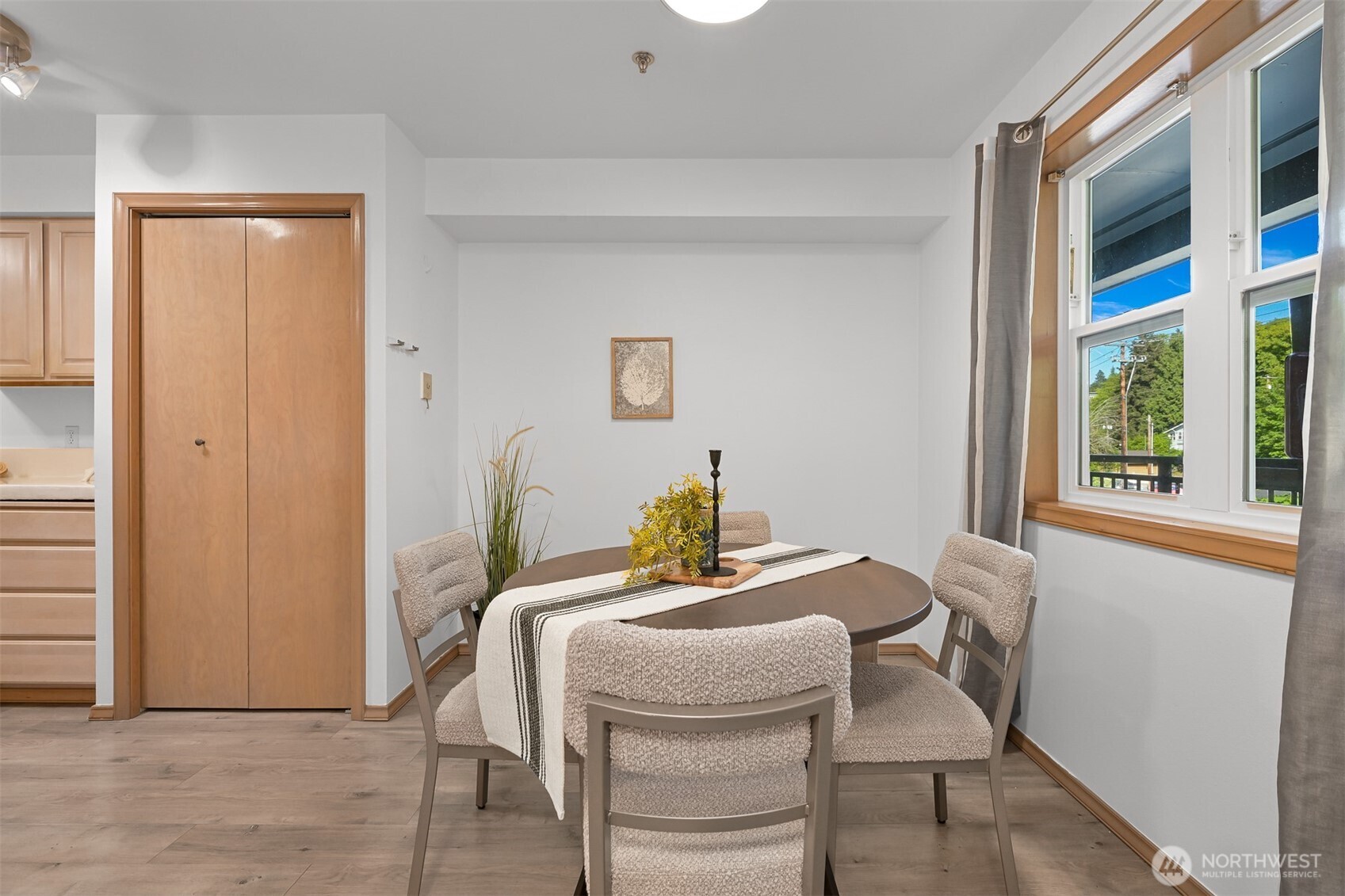 705 North State Street, Unit 202 Bellingham, WA 98225 - Photo 14 of 26 a dining room with furniture and window
